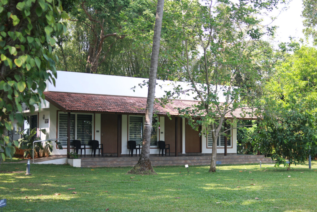 Mandaram villa at Giby Farm with its veranda facing the lawn