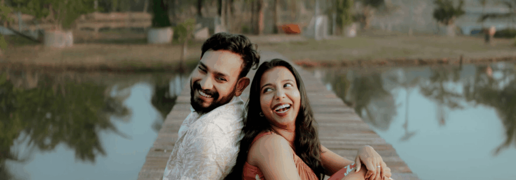Couple photographed beside the backwater at Giby Farm