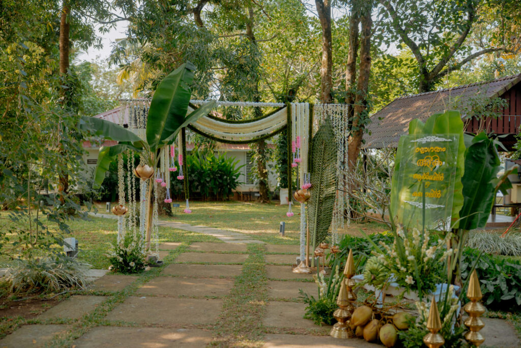 Garden path decorated with drapes and flowers for a celebration at Giby Farm