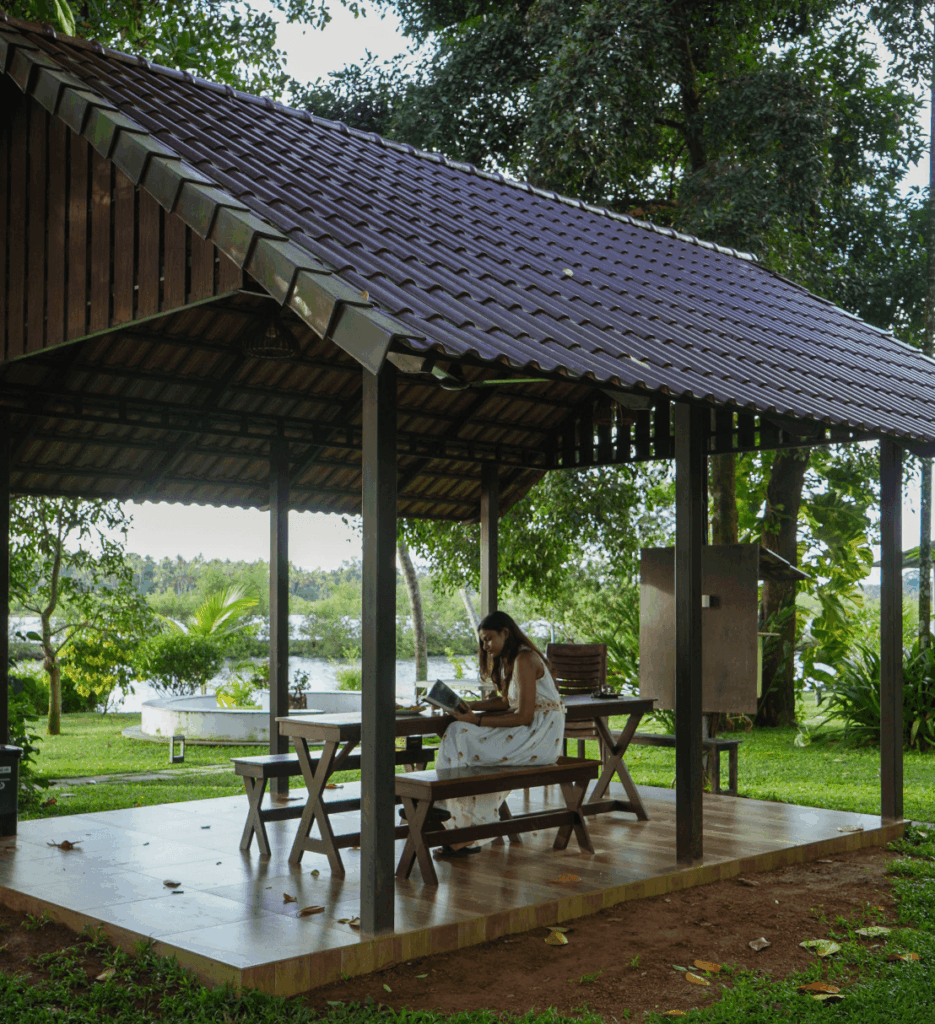 Picnic tables under the open pavilion on the lawn at Giby Farm