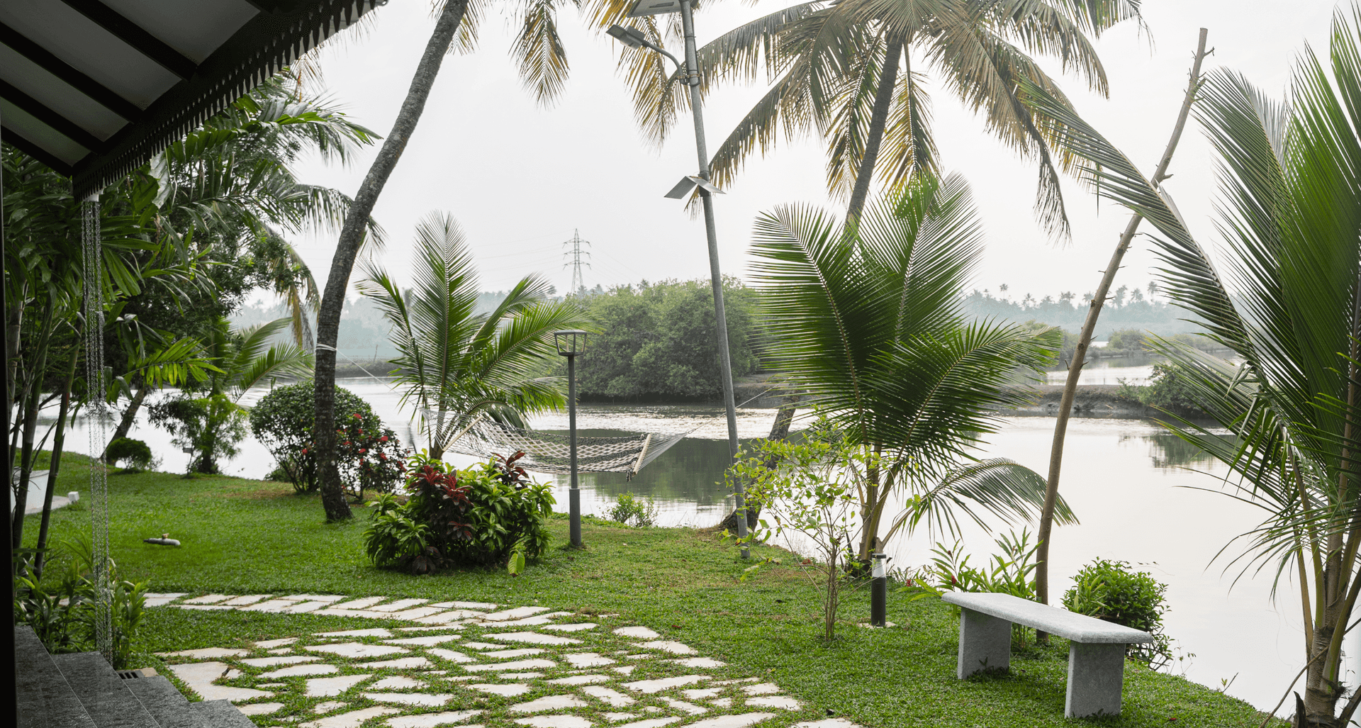 View from the pavilion across the lawn to the backwater at Giby Farm