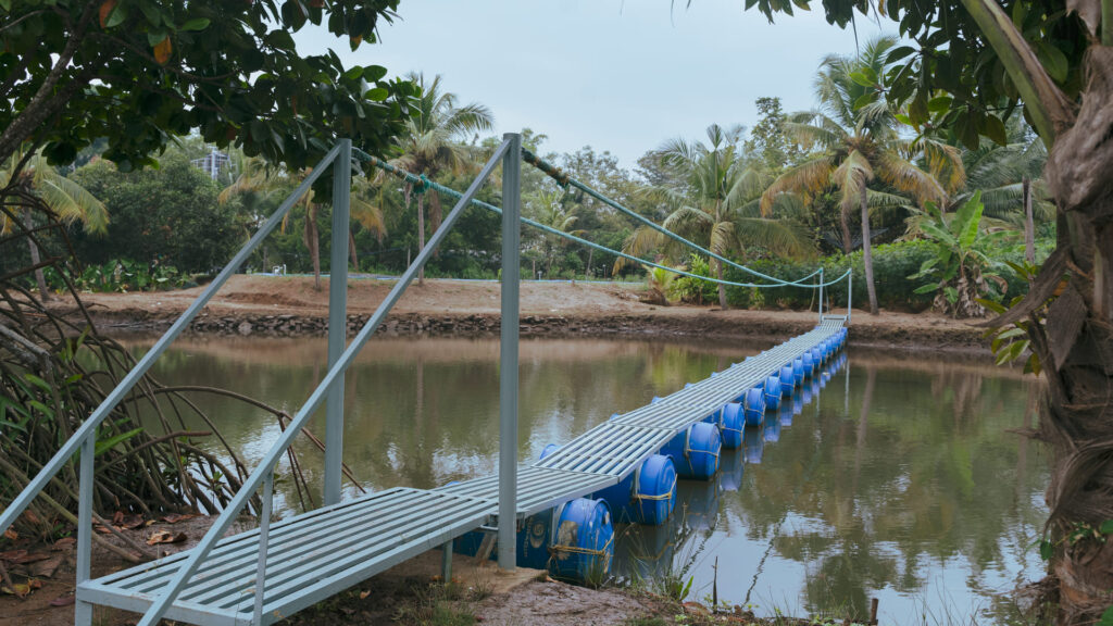 Floating jetty stretching over the backwater at Giby Farm